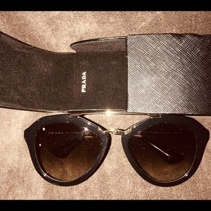 Prada Sun Glasses.